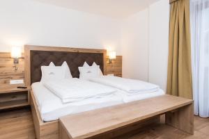Postel nebo postele na pokoji v ubytování Appartement Landhaus KERSCHDORFER