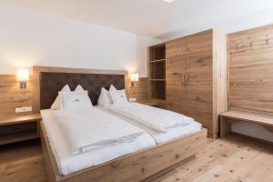 Postel nebo postele na pokoji v ubytování Appartement Landhaus KERSCHDORFER