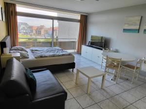 Posezení v ubytování Studio Residentie Astrid