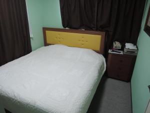 Кровать или кровати в номере Nikko Park Lodge Tobu Station