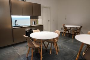 Kuchyň nebo kuchyňský kout v ubytování BLUMI Apartment