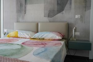 Postel nebo postele na pokoji v ubytování BLUMI Apartment