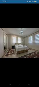 Ένα ή περισσότερα κρεβάτια σε δωμάτιο στο Villa deniz +13 φωτογραφίες