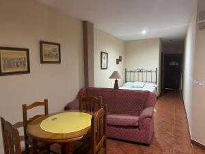 A bed or beds in a room at La Garzona