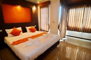 Cama o camas de una habitación en The Sea @ Lanta Hotel