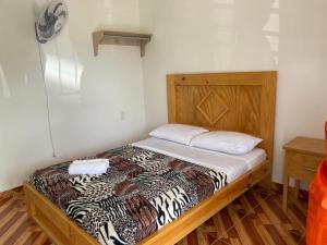 Postel nebo postele na pokoji v ubytování HotelSueños de Acapulco-Eje cafetero-Quindio