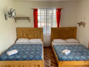 Postel nebo postele na pokoji v ubytování HotelSueños de Acapulco-Eje cafetero-Quindio