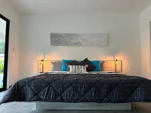 Letto o letti in una camera di Hotel Good Life