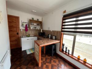 Kuchyň nebo kuchyňský kout v ubytování LOFT Glaciar Serrano
