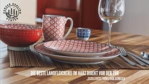Nápoje v ubytování HARZER HEALING CENTER 2024 Romantische Landhauswohnung mit Fussbodenheizung,XXL Kochinsel,XXL Regenduschen,Modern,Hochwertig,Persönlich,Vollausgestattet