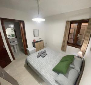 Postel nebo postele na pokoji v ubytování Amery R1 + 2 fotografie