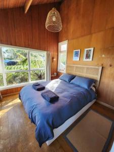 Una cama o camas en una habitación de Rustic paradise nestled in nature