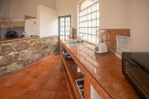 a kitchen with a counter with a blender on it at Sky Temple Yelapa in Yelapa
