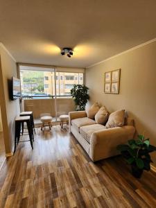 Posezení v ubytování Moderno y céntrico departamento