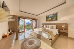 Postel nebo postele na pokoji v ubytování Kelingking Parama Resort + 37 fotografií