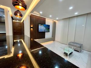 TV a/nebo společenská místnost v ubytování Lujoso apartamento en la ciudad de Neiva-Huila