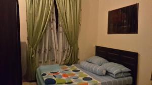 Postel nebo postele na pokoji v ubytování Roemahkoe Holidayhome