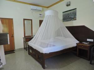 Postel nebo postele na pokoji v ubytování Abba's Glory Land - Agonda