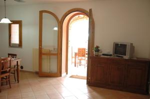 TV a/nebo společenská místnost v ubytování Agriturismo Podere Gozzuto