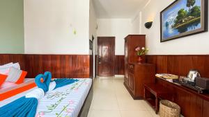 A bed or beds in a room at The Center Point