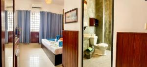 A bed or beds in a room at The Center Point