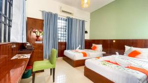 A bed or beds in a room at The Center Point