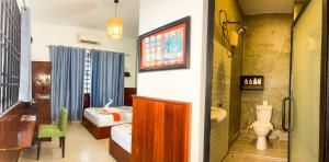 A bed or beds in a room at The Center Point