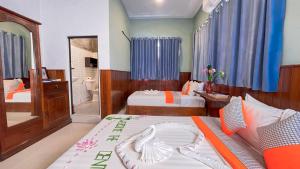 A bed or beds in a room at The Center Point