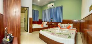 A bed or beds in a room at The Center Point