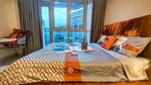 EG Private House -BGC UPTOWN客房内的一张或多张床位