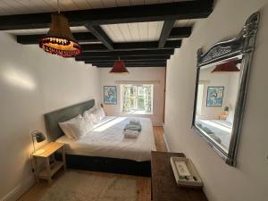 Katil atau katil-katil dalam bilik di Cotswold Cottage