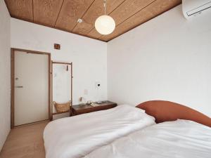 Letto o letti in una camera di Tipy records inn photon