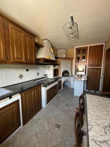 Kuchyň nebo kuchyňský kout v ubytování Appartamento Gallicano - La Tana