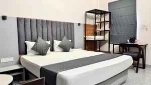 Postel nebo postele na pokoji v ubytování Hotel Insta 18