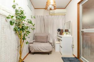 Coin salon dans l'établissement Momodani 72 two-story detached house