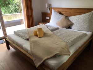 Łóżko lub łóżka w pokoju w obiekcie Apartmán Fürth