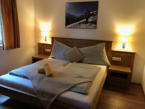 Łóżko lub łóżka w pokoju w obiekcie Apartmán Fürth