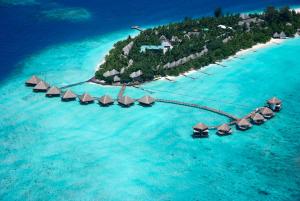 an island in the ocean with a bunch of resorts at Adaaran Club Rannalhi - All Inclusive - 45 Minutes away from Male by Speedboat in South Male Atoll