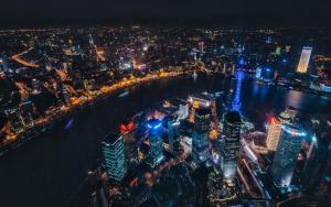 an aerial view of a city at night at Shanghai Atour Hotel On The Bund- People Square in Shanghai