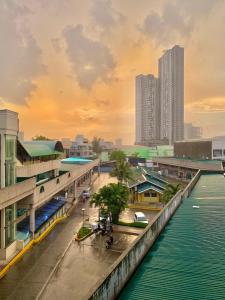 a view of a city with a river and buildings at Cebu Century Plaza Hotel in Cebu City