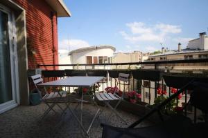 Μπαλκόνι ή βεράντα στο Superbe chambre avec terrasse dans un appartement partagé dans le centre de Paris
