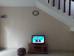TV a/nebo společenská místnost v ubytování T Home + 5 fotografií