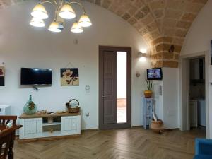 A television and/or entertainment centre at La Casa Di Chia