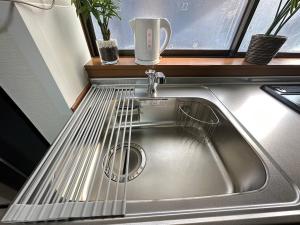 一棟貸切 駒込フルリノベーション古民家 Switch付き 池袋新宿渋谷秋葉原にあるキッチンまたは簡易キッチン