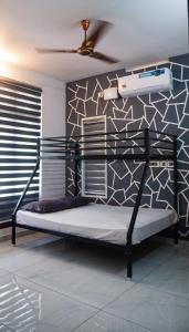 Postel nebo postele na pokoji v ubytování Varkala Life Homestay