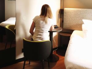 Postel nebo postele na pokoji v ubytování ibis Lille Centre Grand Place