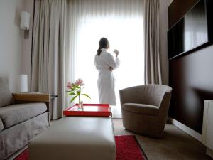 TV a/nebo společenská místnost v ubytování Novotel Athens
