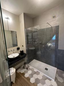 Koupelna v ubytování Graziella Patio Hotel