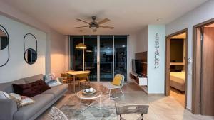 a living room with a couch and a table at Beach, Mountain and More! in Nueva Gorgona