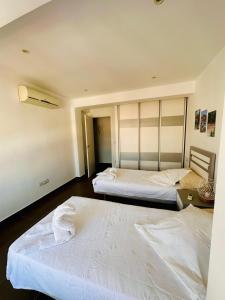 En eller flere senge i et værelse på Caminos del Mediterráneo